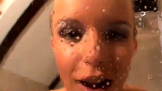 Hot babe with perfect big boobs taking shower