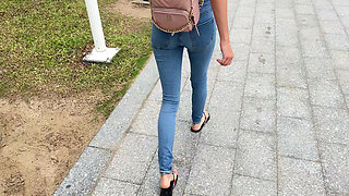 Public Wetting Jeans in Park Near the Beach