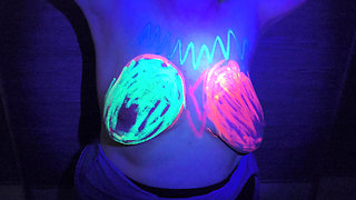 Her tits glowing in the dark