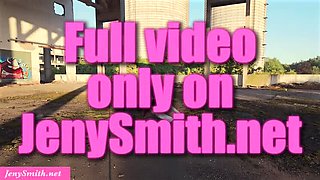 Sexy redhead Jeny Smith gets caught stripping naked at abandoned construction site outdoor