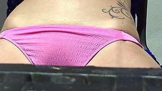 Sunbathing on the balcony topless