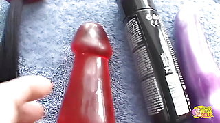 Ashley Blue Uses a Golden Strapon and a Few Toys to Make Heather Gables Cum