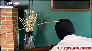 Supermodel Dominatrix Teacher Caning Over Knee Of Bad Student