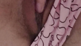 I masturbate my hairy pussy under the table in class