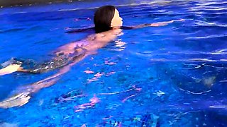 Monika Fox In Purple Bikini Swims In Pool & Poses By Window