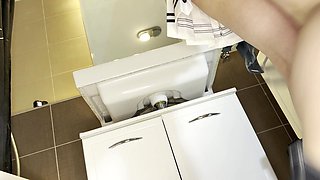 Cute and Hot Sexy Tight Pussy Cheerleader Shows Her Shaved and Wet Pussy Under Her Mini Skirt in the Bathroom
