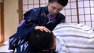 Lustful Oriental housewife massages a dick with her mouth