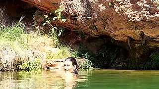 Wild girl posing naked and playing with herself outdoors