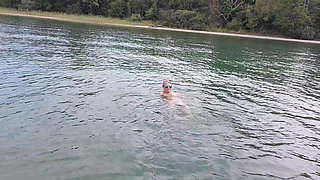 Sexy Granny Swims Naked in a Lake!