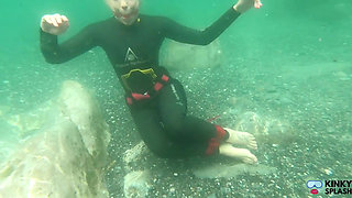 Ocean Rope Bondage with Ballgag in Wetsuit