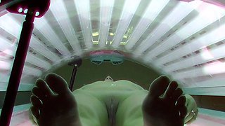 Beautiful MILF in solarium