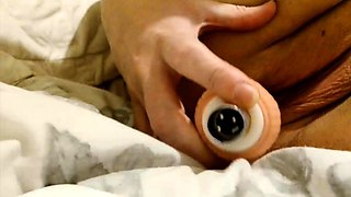 Suzy demonstrates how rubber cock enters her pussy close up