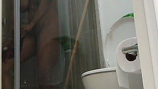 Brunette Gets Caught Masturbating in the Shower