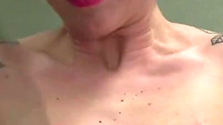 Tattooed Cora breast whip