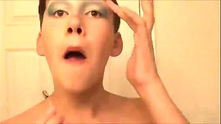 Obscene crossdresser puts on clothes and shows off his assets