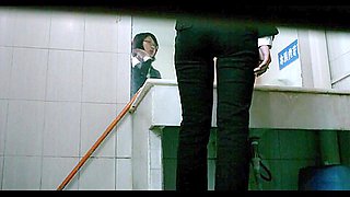 Redhead Japanese girl makes a quick piss on