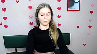 Young Ukrainian blonde in red panties posing on webcam show