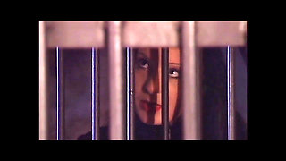 Two Beautiful Young Vintage Lesbians with Strapon in a Cage