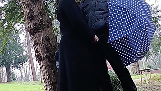 Muslim woman plays and blows a large cock outside in the park