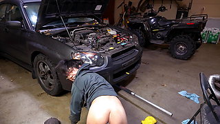 Slutty mechanic in the shop with a plug in his ass