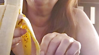 Hot all natural MILF eats a ripe banana per request