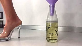 Hairy Mature Wife Peeing in a Bottle Through a Funnel