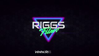 In a kitchen a sexy brunette playing with her big boobs