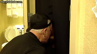 Gloryhole gaydaddy opens his mouth to suck his boyfriends cock