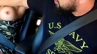 Traffic Blowjob: Exhibitionist Brunette Shows Her Tits and Sucks It All in the Car