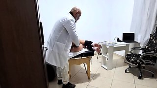 A MILF gets fingered by the proctologist during an anal