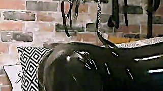 Large Strap-on Gapes Gigi in Latex Catsuit