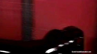 Goddess in latex dominating immobilized femdom slave