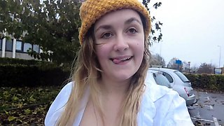 Outdoor solo masturbation scene with curly blonde