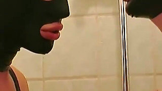 Hot masked babe is having fun with her friend in the bathroom