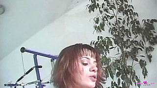 Pretty Redhead Shows off Her Big Ass and Gets Her Holes Fucked in a Gangbang.