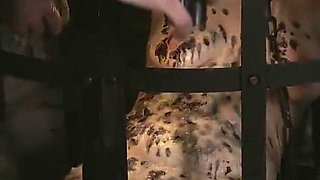 A Naked Witch in a Cage Gets to Feel Ice-cold Water and Hot Wax