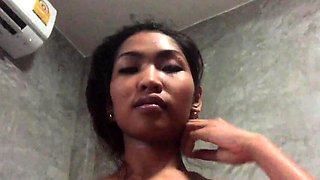 Exquisite Thai teen with huge natural boobs rides my dick