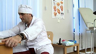 Sexy playgirl is showing her hairless cunt to her doctor