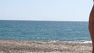 Fans Peeping Me Giving a Blowjob on a Public Nudist Beach