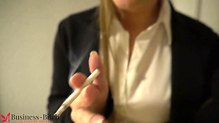 business woman smoking a cigarette