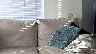 Busty curly brunette with big boobs fucks on couch