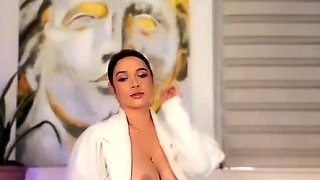 Busty curly brunette with big boobs fucks on couch