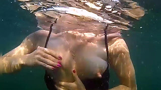 Swimming and Flashing in the Sea