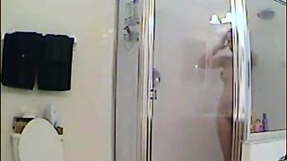 MILF stepmother spied in the shower