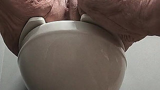 She's Enjoying Rubbing Her Pussy on the Toilet