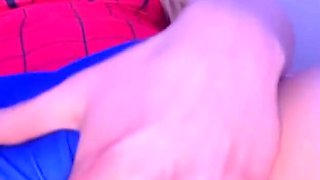 Solo spider-girl rubs her clit and uses her toys