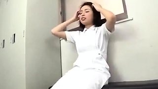 Japanese babe in schoolgirl uniform masturbates