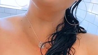 Busty curly brunette with big boobs fucks on couch