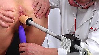Rectal speculum exam and machine orgasm of hot MILF