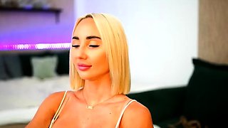Blonde mature with big boobs masturbates in bed